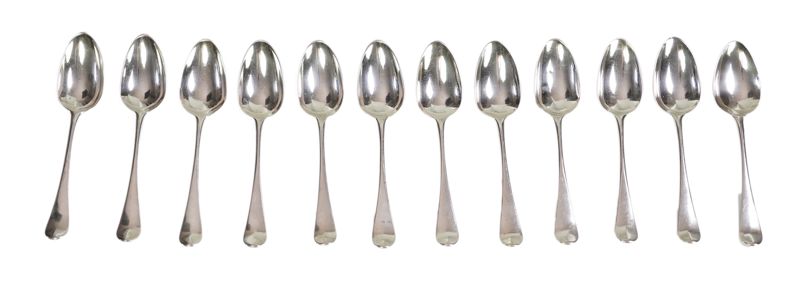 A set of twelve George III silver Hanoverian pattern table spoons by Walter Tweedie, the terminals engraved with the family crest of The Right Reverend Robert Lowth, Bishop of London, (1710-1787)